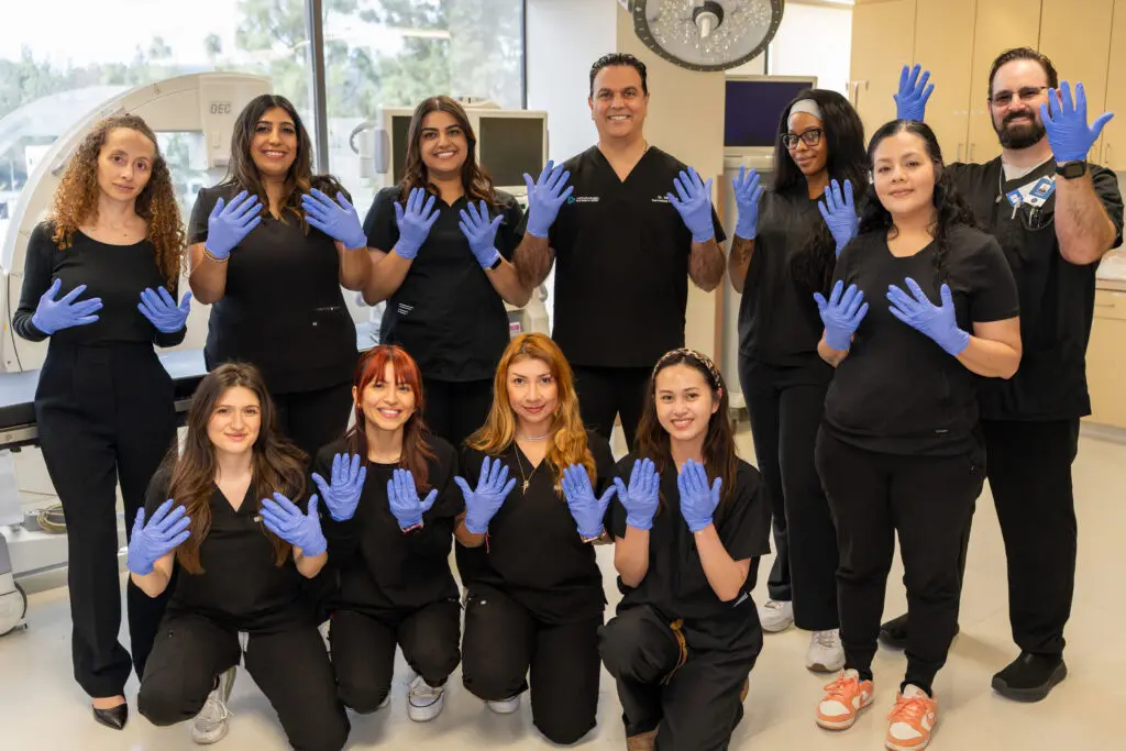 Apmg Pain Management Team In Los Angeles County Taking A Group Photo In The Or