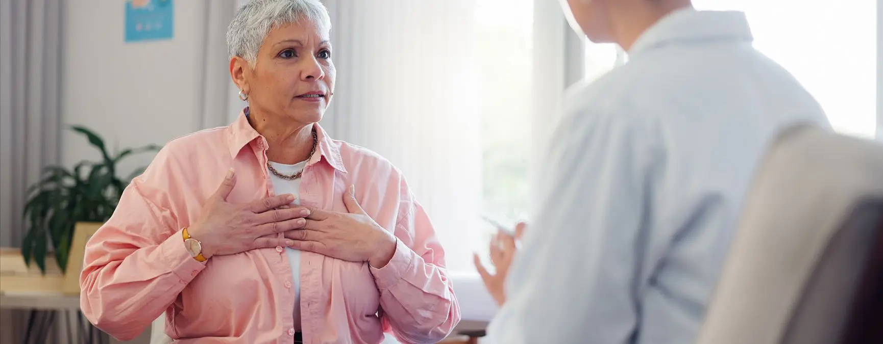Person at a medical facility, asking the practitioner about PRP and Cortisone Injections.