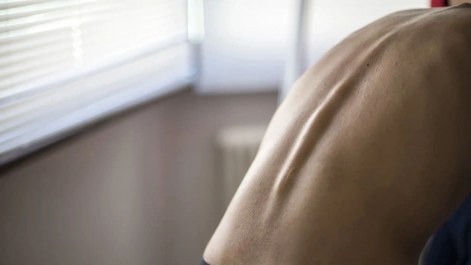 Doctor examining patient with scoliosis