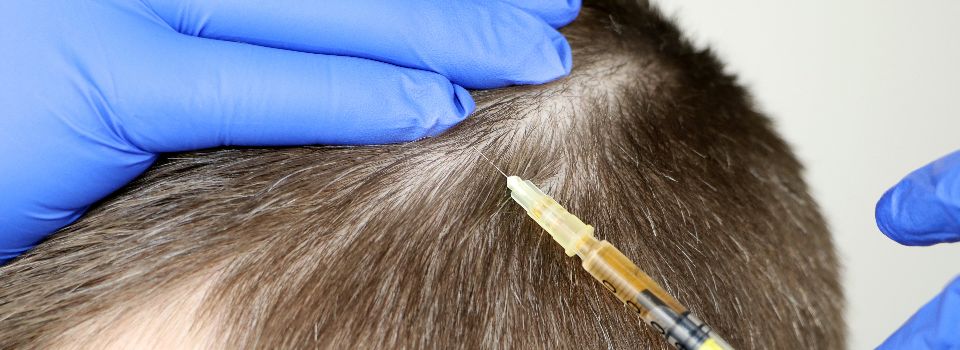 Patient receiving Occipital Nerve Block treatment.